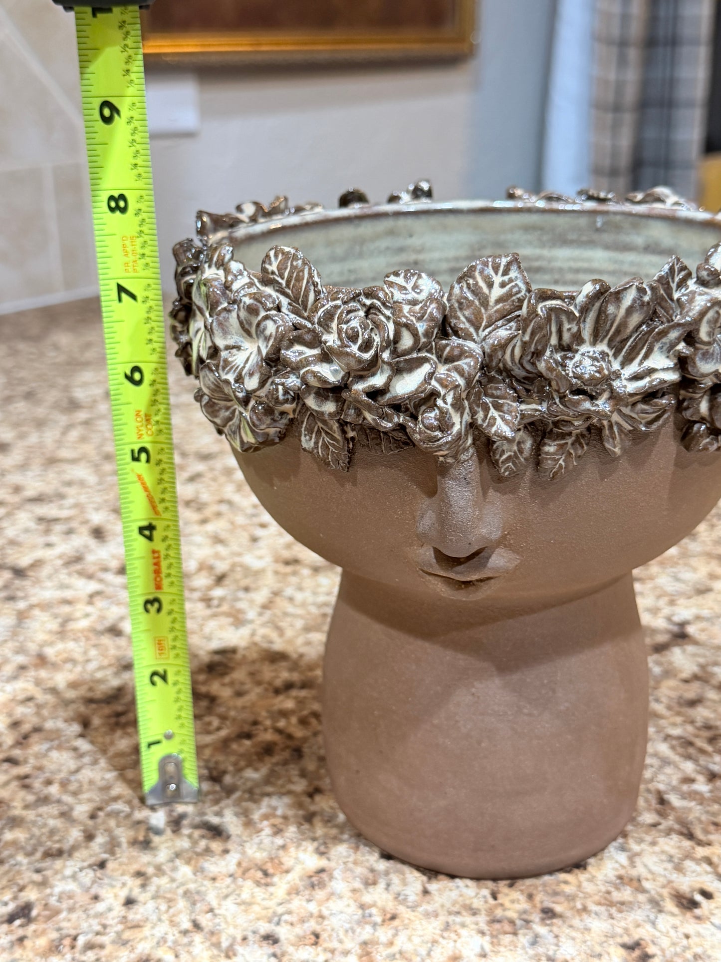 Floral face vase