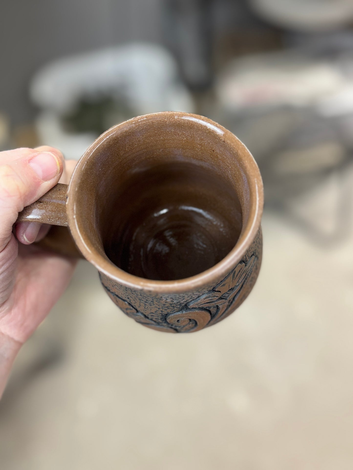 Tooled leather flower mug