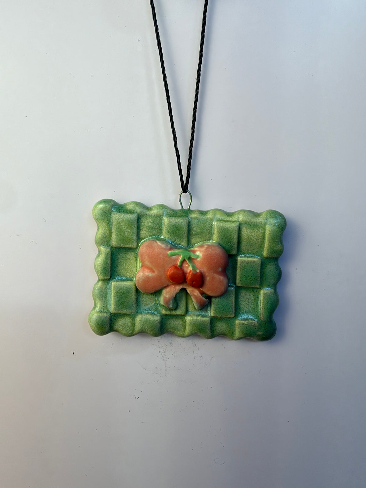 Checkered Ornament – Cherry Bow