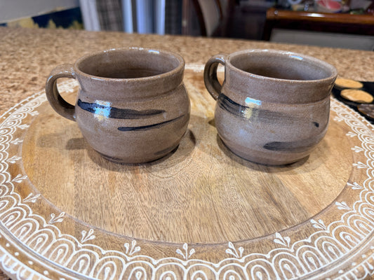 Brown abstract mugs