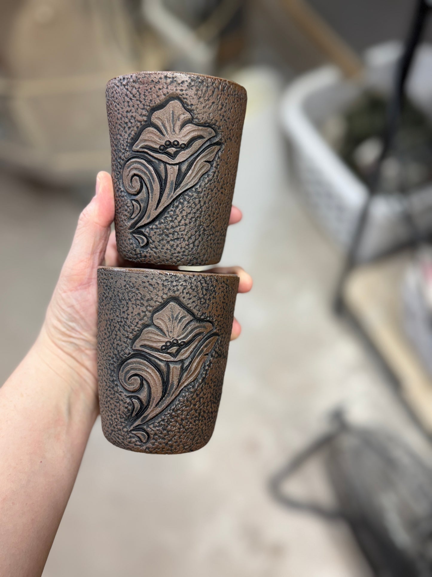 Tooled leather flower tumblers