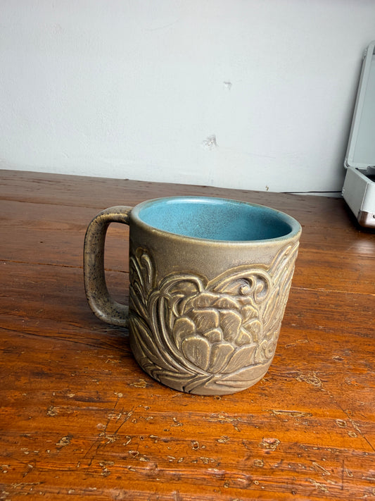 Tooled leather flower mug